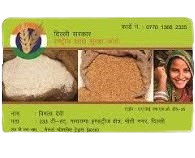 A person using a laptop to crop a Delhi Ration Card PDF with editing software, preparing for high-quality printing.